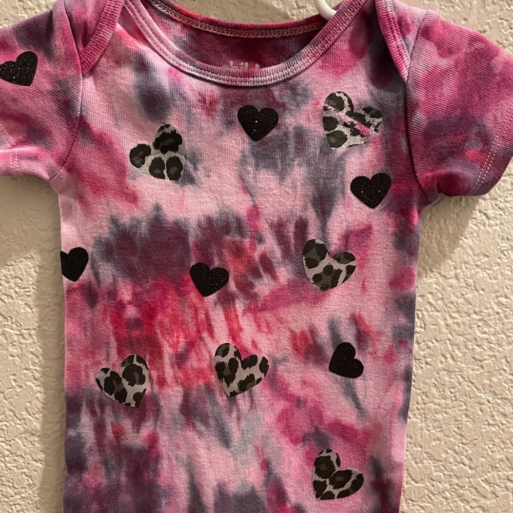 Hand tie dyed baby onesie